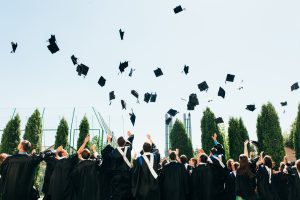 Successful graduates in academic dress